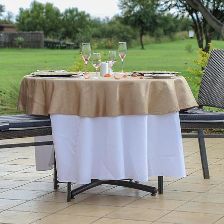 Royal Marang Hotel Phokeng ภายนอก รูปภาพ A table with a tablecloth